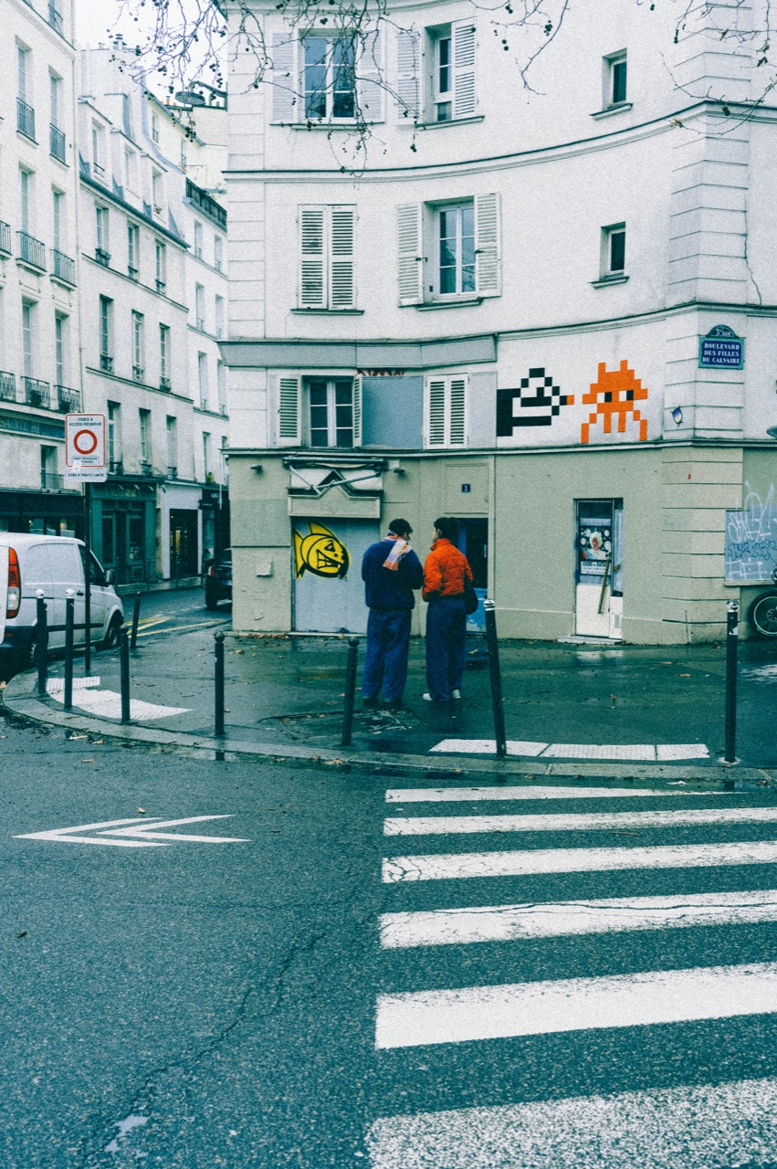 Invader mosaic art on a building corner